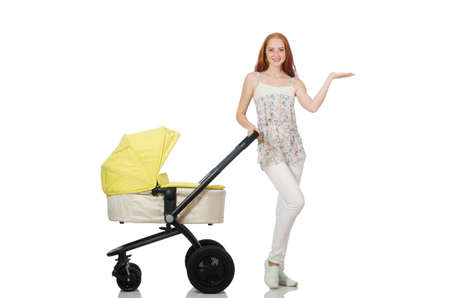 Woman with baby and pram isolated on white