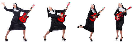 Nun with guitar isolated on whiteの写真素材