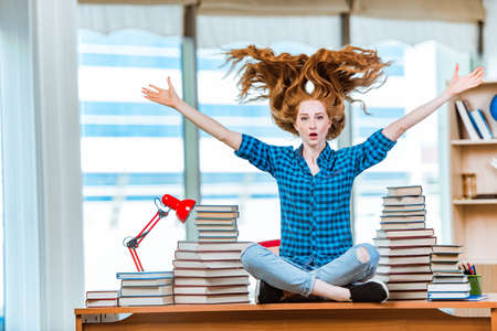 Young female student preparing for examsの写真素材