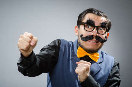 Funny man against dark backgroundの写真素材