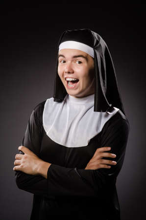 Funny man wearing nun clothingの写真素材