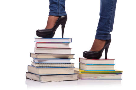 Climbing the steps of knowledge - education conceptの写真素材