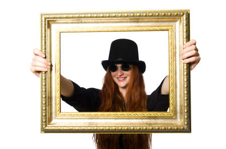 Woman with picture frame isolated on whiteの写真素材