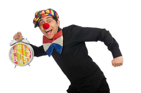 Funny clown with clock isolated on whiteの写真素材
