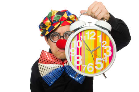 Funny clown with clock isolated on whiteの写真素材