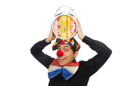 Funny clown with clock isolated on whiteの写真素材