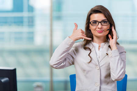 Call center operator working in the officeの写真素材