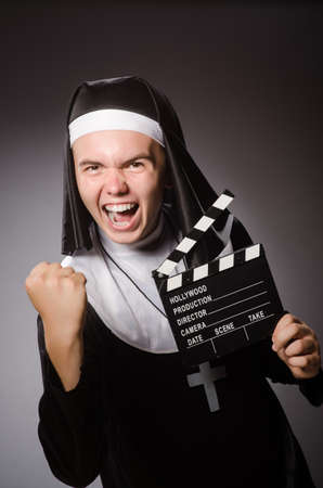 Funny man wearing nun clothingの写真素材