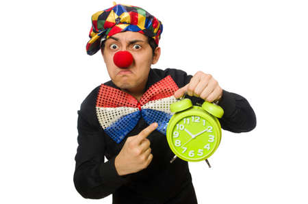 Funny clown with clock isolated on whiteの写真素材