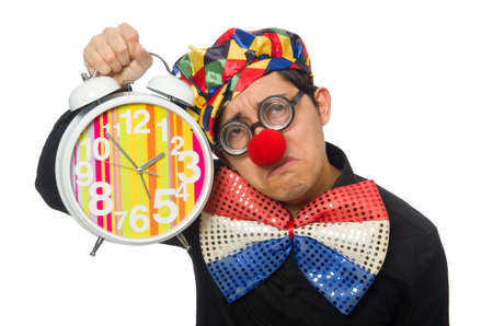 Funny clown with clock isolated on whiteの写真素材