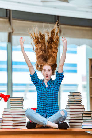 Young female student preparing for examsの写真素材