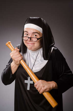 Funny man wearing nun clothingの写真素材