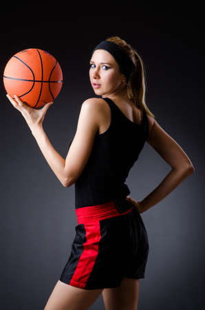 Woman with basketball in sport conceptの写真素材