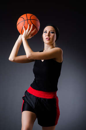 Woman with basketball in sport conceptの写真素材