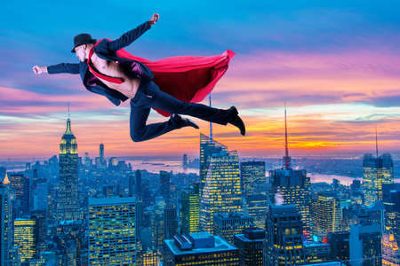 Superhero and the city in conceptの写真素材