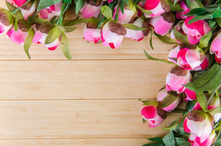 Rose flowers arranged with copyspace for your textの写真素材