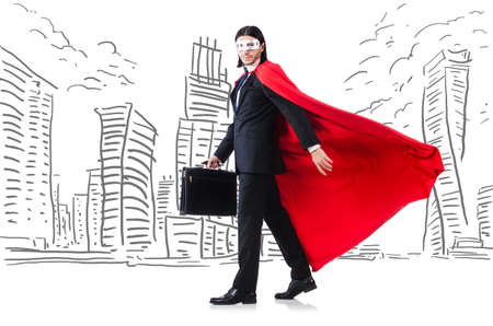 Man in red cover with skyscapers at the backgroundの写真素材