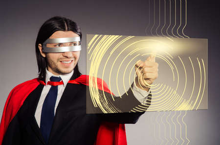 Man pressing virtual buttons in futuristic concept
