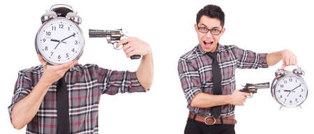 Young man with clock isolated on whiteの写真素材