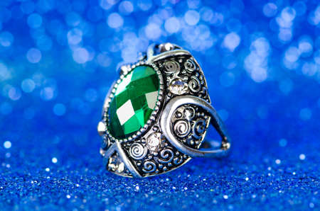Jewellery ring against blue backgroundの写真素材