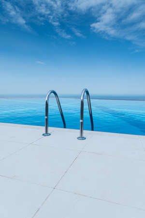 Infinity pool on the bright summer dayの写真素材