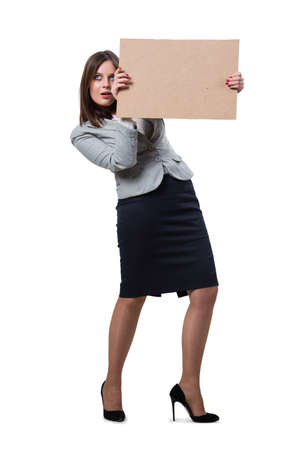 Businesswoman with blank message on whiteの写真素材
