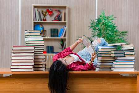 Young female student preparing for college school examsの写真素材