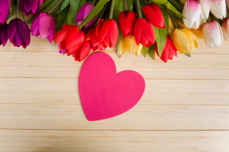 Tulips flowers arranged with copyspace for your textの写真素材