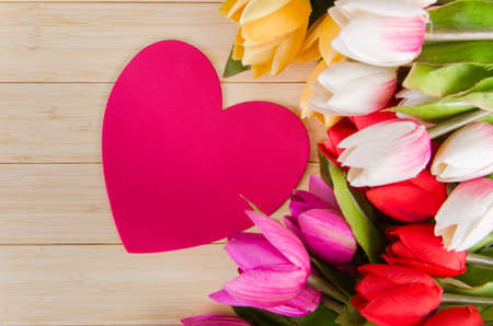 Tulips flowers arranged with copyspace for your textの写真素材