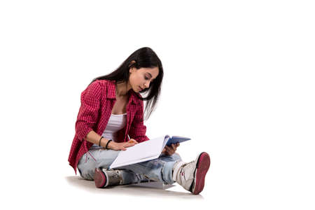 Young female student preparing for examsの写真素材