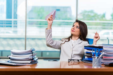 Businesswoman sitting at the office deskの写真素材