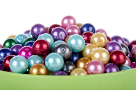 Pearls in the bowl isolated on white backgroundの写真素材