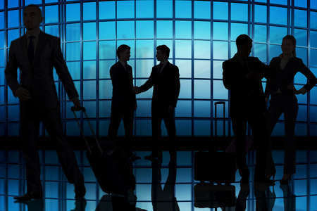 Business people walking in the office centerの写真素材