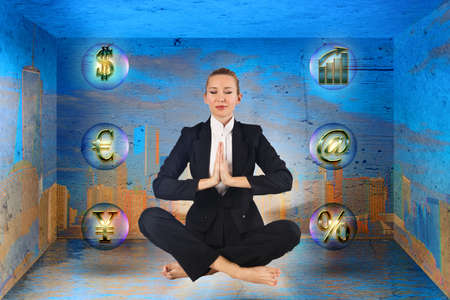 Businesswoman meditating in the boxの写真素材