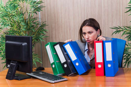 Tired woman stressed with too much work