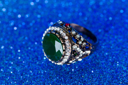 Jewellery ring against blue backgroundの写真素材