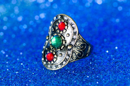 Jewellery ring against blue backgroundの写真素材