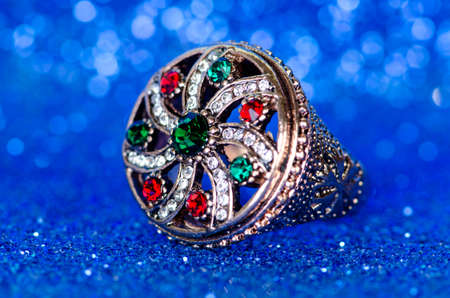 Jewellery ring against blue backgroundの写真素材