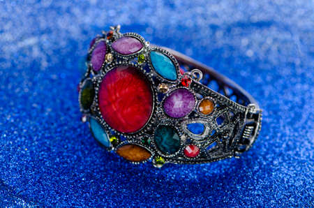 Jewellery ring against blue backgroundの写真素材