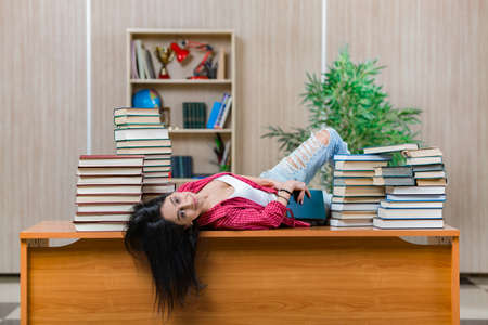 Young female student preparing for college school examsの写真素材