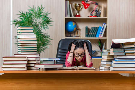 Young female student preparing for college school examsの写真素材