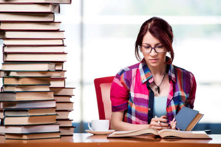 Young female student preparing for exams