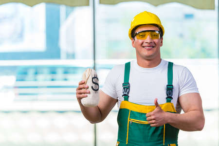 Young construction worker working at the siteの写真素材