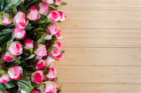 Rose flowers arranged with copyspace for your textの写真素材