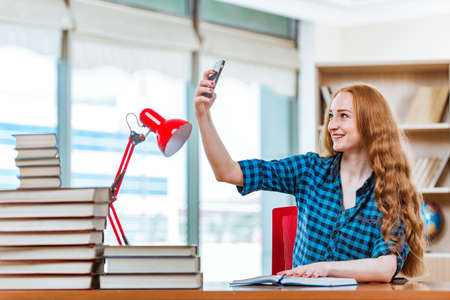 Young female student preparing for examsの写真素材