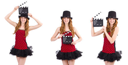 Pretty girl in red polka dot dress with movie board  isolated on white