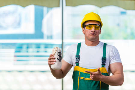 Young construction worker working at the siteの写真素材