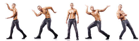 Ripped man pushing away virtual obstacleの写真素材