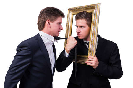Two twins businessmen arguing with each other isolated on whiteの写真素材