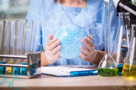 Experienced lab assistant working on chemical solutions